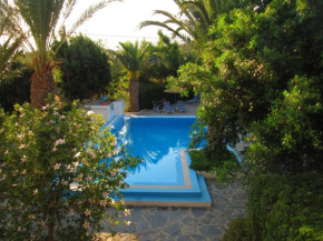 Отель Oasis Apartments & Rooms  Миртиос